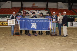 The Berry College IHSA National Championship Western team stands in the Eastern States Exposition arena after their win in early May.