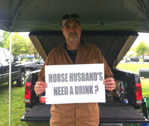 Horse hubby Larry Long reading the  minds of horse husbands everywhere during a long day at Rolex (Photo: contributed).