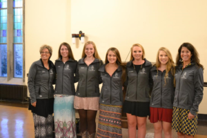 The Berry College equestrian team celebrated their second consecutive IHSA Western Team national championship in the Ford Dining Hall on the college campus Sept. 18. From left: Assistant Western Coach Debra Wright, Emily Lambert, Sarah Cooper, Allie Robertson, Elizabeth Poczobut, Annalee Cooley and Head Coach Margaret Knight. The team members received rings, belt buckles and ribbons at the banquet. Here, they display their national championship jackets. (Photo by Hillery Rolle)