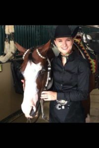 Analisa Camelin is a junior at the University of Louisiana majoring in English and minoring in journalism. She shows her horse, “Always Radical” in amateur all-around events.