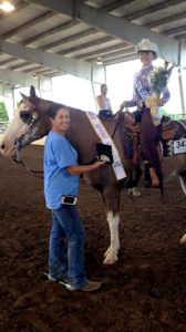 Olivia Campbell took the Queen title at this year's state show on "Orkies Freckles." Here she is with her trainer, Keri Davidson. (Contributed photo)