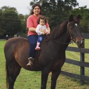 Gloria Gonzalez with her “product director,” her young daughter, Claudia Hughey. 